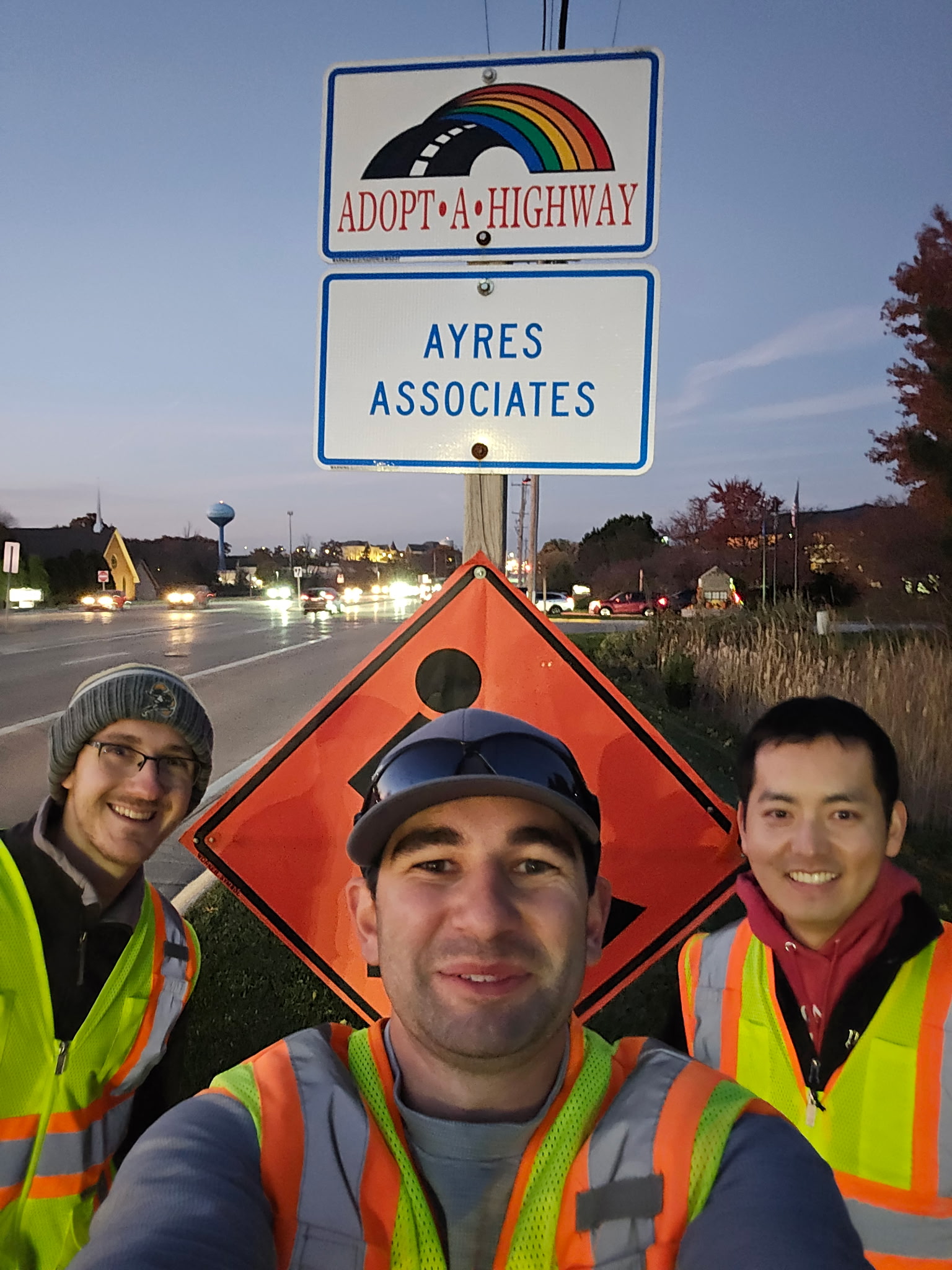 Ayres staff cleaning up roadway