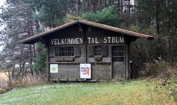 Village of Strum welcome sign, stating Velkommen Til Strum.