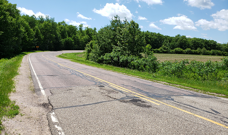 weathered road possible candidate for mill and overlay