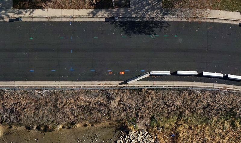 This photo shows utility line markings taken from a drone for the Greeley Loveland Irrigation Canal and Lake Drive stabilization project for the City of Loveland, Colorado. 